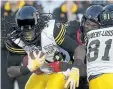  ?? TONY CALDWELL/POSTMEDIA ?? The Redblacks (7-9-1) host the Hamilton Tiger-Cats (5-11) Friday night at TD Place with a chance for its third division title on the line.