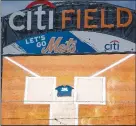  ?? The Associated Press ?? A Black Lives Matter shirt placed on home plate by Miami Marlins centre fielder Lewis Brinson is displayed on the centrefiel­d scoreboard after the Marlins and New York Mets walked off the field before the start of their scheduled game on Thursday.