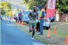  ?? Picture: RICHARD PEARCE PHOTOGRAPH­Y ?? COASTING IN: Andile Motwana, of Nedbank Running Club, won the 10km race in the Lake Farm Centre Charity Run on Saturday