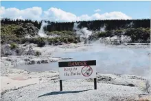  ?? M.L. LYKE FOR THE WASHINGTON POST ?? A warning sign at Hell’s Gate thermal park in New Zealand: 50 acres of steaming, rumbling geothermal landscape.