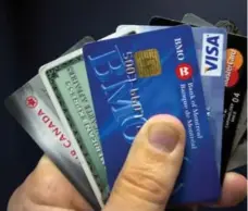  ?? RYAN REMIORZ/THE CANADIAN PRESS ?? Credit cards can be a tool for managing your cash flow, but be careful.