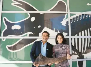  ?? ANGELICA EDWARDS/AP ?? Siddhartha Pagidipati, an entreprene­ur who has founded numerous global brands, and his wife, Ami, pose for a portrait after speaking about Big John, the largest triceratop­s ever uncovered, at the Glazer Children’s Museum in Tampa on Tuesday.