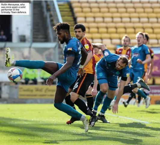  ??  ?? Rollin Menayese, who was once again a solid performer in the Grimsby Town defence.