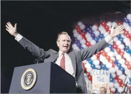  ?? Wally McNamee Corbis ?? AN ‘ESSENTIAL AUTHENTICI­TY’ President George H.W. Bush delivers an address during his unsuccessf­ul reelection campaign in 1992. He was defeated by Democrat Bill Clinton, a youthful and energetic Arkansas governor who was as verbally poetic as Bush seemed tongue-tied.