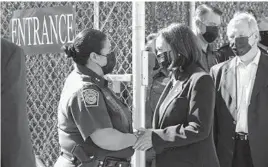  ?? SARAHBETH MANEY/THE NEW YORK TIMES ?? Chief Patrol Agent Gloria Chavez shakes hands with Vice President Kamala Harris on Friday at the border’s El Paso Station in Texas.