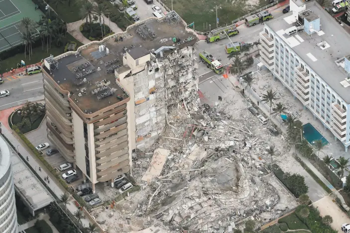  ?? Amy Beth Bennett / Associated Press ?? An aerial photo shows part of the 12story oceanfront condo that collapsed in Surfside, Fla. Authoritie­s did not say what may have caused the collapse.