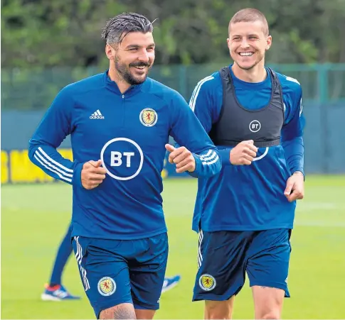  ??  ?? Callum Paterson, left, and Lyndon Dykes during a Scotland training session as the national side prepares for the huge game against Israel.