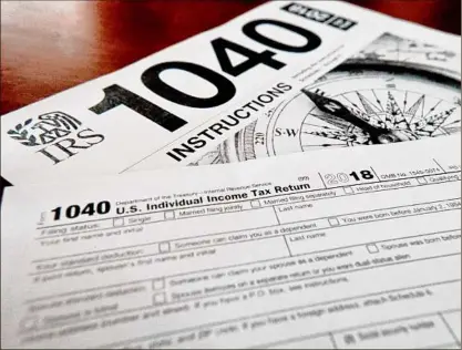  ?? Keith Srakocic / Associated Press ?? Unlike a deduction, which decreases the income on which you’ll be taxed, a tax credit reduces your overall tax due. The result can mean hundreds of dollars knocked off your bill — or added to your refund.