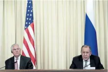  ?? THE ASSOCIATED PRESS FILES ?? Russian Foreign Minister Sergey Lavrov, right, and U.S. Secretary of State Rex Tillerson attend a news conference following their talks in Moscow, Russia in April. Russia on Friday, promised a “tough response” after U.S. issued its order to shut the...