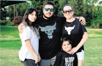  ?? JULIAN DAVIS FIU ?? Lucas Salazar, 5, underwent years of grueling treatment for leukemia. Lucas, who is cancer-free, poses with, from left, his sister, Luciana Salazar; his dad, Carlos Salazar; and his mom, Jessica Encalada.