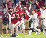  ?? MICKEY WELSH/THE MONTGOMERY ADVERTISER VIA AP ?? Alabama running back Najee Harris (22) scores a touchdown on a long run against Auburn on Saturday in Tuscaloosa, Alabama.