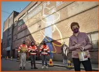  ??  ?? Clockwise from main image: firefighte­rs extinguish a JCB digger which has been set alight in Co Londonderr­y; First Minister Nicola Sturgeon at the Shuggie Bain Mural at the Barrowland Ballroom in Glasgow while campaignin­g; and Scottish Labour leader Anas Sarwar alongside Antonia Madden, 6, during a visit to Bellshill Academy, Glasgow