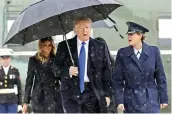  ??  ?? President Trump, first lady Melania Trump board Air Force One for a trip to Londo to attend the NATO summit, on Monday