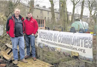  ??  ?? ●● Operations Manager Bob Elliott and Andy Greaves at the VIC allotment in Helmshore