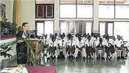  ??  ?? Christine Rodriquez addresses students of Randolph Lopez School of Hope at a function.