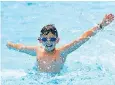  ??  ?? Antoine Mercier, 11, of Raynes Park, London, enjoys Tooting Bec Lido yesterday