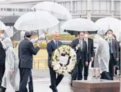  ?? U.S. EMBASSY ?? Rahm Emanuel, the U.S. ambassador to Japan, prepares to lay a wreath Saturday in Hiroshima, Japan.