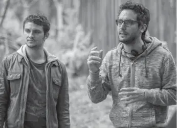  ?? SONY ?? Actor Shiloh Fernandez, left, with director Fede Alvarez on the set of Evil Dead, opening Friday.