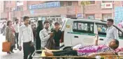  ?? PIC/NAVEEN SHARMA ?? Patients stranded outside LNJP Hospital on Wednesday