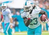  ?? JIM RASSOL/STAFF FILE PHOTO ?? Dolphins RB Jay Ajayi is coming off a season where he rushed for 1,272 yards and was named to the Pro Bowl.