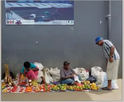  ??  ?? Enjoying the fruits of my canning labor (above) will instantly bring me back to the places and markets where I bought the produce, and the vendors I’ve met, like these ladies in Lautoka, Fiji (above).