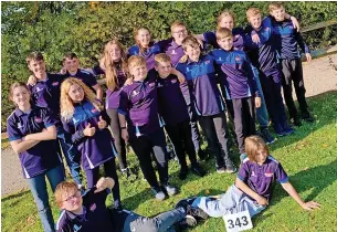  ?? ?? ●●The Whitworth Orienteeri­ng Team take part in the British Schools Score Championsh­ips in Derbyshire