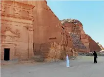  ?? VIVIAN NEREIM/WASHINGTON POST ?? Birgit Mitchell, an American tourist, right, visits Mada’in Saleh with her guide.