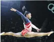  ??  ?? American Simone Biles performs on the balance beam in Tuesday’s team final in Rio de Janeiro. The U.S. won the overall gold.