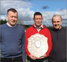  ??  ?? The winning team in the MacBride Pitch & Putt Club Winter League - Jimmy Flood, Mark Donnelly and Greg Hoey - with the trophy.