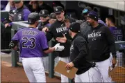  ?? MATT YORK — THE ASSOCIATED PRESS ?? Rockies left fielder Kris Bryant celebrates his two-run home run against the Royals during the second inning of a spring training game on Wednesday in Scottsdale, Ariz.