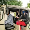  ??  ?? Minister Duminda Dissanayak­e, Ambassador-designate Holger Seubert and GIZ Sri Lanka Country Director Christiane Einfeldt on a test drive in electric three-wheeler, winner of private sector category