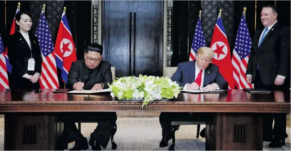  ?? Photo: AFP ?? US President Donald Trump and North Korean leader Kim Jong Un signed a joint statement on Tuesday agreeing to pursue the denucleari­zation of the Korean Peninsula on June 12, 2018.