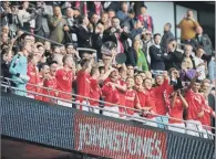  ??  ?? FANS SALUTE: Almost 60,000 spectators saw Barnsley lift the JP Trophy at Wembley. How many will be attracted to this seasons’s final?