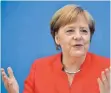 ?? FOTO: DPA ?? Vor dem Urlaub in der Offensive: Bundeskanz­lerin Angela Merkel am Freitag in Berlin.