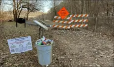  ?? Pittsburgh Post-Gazette photos ?? Work continued last week to correct a drainage problem on a section of the Three Rivers Heritage Trail known as Eagle Lake. Part of the trail here turns into a deep, wide puddle after storms, and it freezes over in winter.