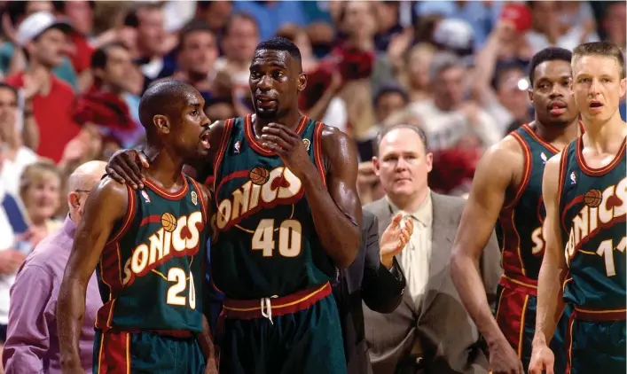  ?? Photo Getty Images ?? The Seattle Supersonic­s, featuring Gary Payton (No 20) and Shawn Kemp (No 40), were a super side.