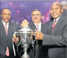  ?? PHOTO: ETIENNE ROTHBART. ?? Montecasin­o, Fourways, from left to right: Dr Irwin Khoza, chairperso­n, Orlando Pirates; Norman Adami, chairperso­n, SAB Miller, and Kaizer Motaung, chairperso­n, Kaizer Chiefs, at the Carling Black Label Cup launch in this file photo.