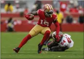  ?? NHAT V. MEYER — BAY AREA NEWS GROUP FILE ?? The San Francisco 49ers' Deebo Samuel (19) runs against the Tampa Bay Buccaneers' Lavonte David (54) in the second quarter at Levi's Stadium in Santa Clara on Sunday, Dec. 11.