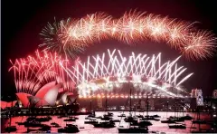  ??  ?? SYDNEY HARBOUR FIREWORKS: City lights up to dazzle crowds with firework display while bush fires ravage Australia