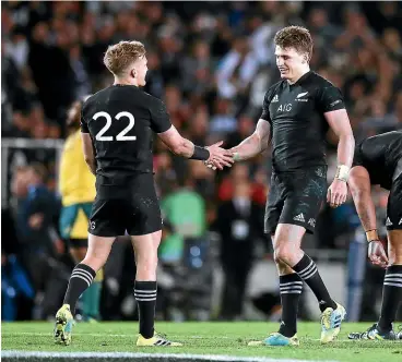  ?? GETTY IMAGES ?? Damian McKenzie, left, gave it a good nudge but Beauden Barrett, right, is king of the Bronco test.