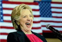  ?? PHOTO: REUTERS ?? United States Democratic presidenti­al nominee Hillary Clinton laughs as she takes the stage at a campaign rally in Raleigh, North Carolina yesterday.