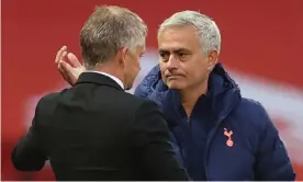  ??  ?? Ole Gunnar Solskjær gets a pat on the head from José Mourinho after his Manchester United team’s 6-1 home defeat by Tottenham. Photograph: Carl Recine/Reuters