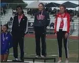  ?? COURTESY PHOTO/GREG WRIGHT ?? Lodi's Emily DuBois stands atop the podium after winning the high jump at the Sac-Joaquin Section Masters Championsh­ips at 5 feet, 6 inches.