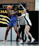  ?? PATRICK BREEN/THE REPUBLIC ?? Xavier Prep center Irene Guiamatsia (52) posts up Gilbert’s Aspen McClees (24) during a game at Gilbert High School on Jan. 9.