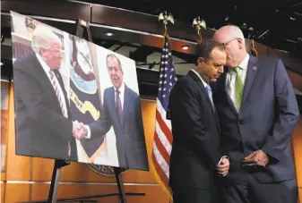  ?? Alex Brandon / Associated Press ?? Rep. Adam Schiff, D-Calif. (left), confers with Rep. Joe Crowley, D-N.Y., on Capitol Hill next to a photograph of President Donald Trump and Russian Foreign Minister Sergey Lavrov.