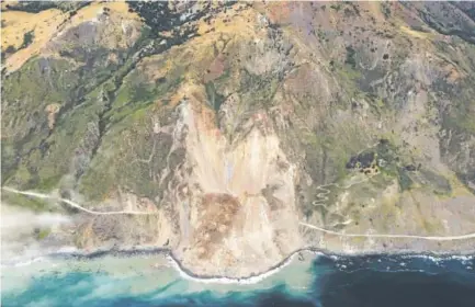  ??  ?? A massive landslide along California’s Highway 1 buried the road under a 40-foot layer of rock and dirt. A swath of the hillside gave way in an area called Mud Creek on Saturday, covering about one-quarter of a mile of road. John Madonna, via The...