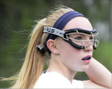  ?? PHOTOS BY ED BURKE — THE SARATOGIAN ?? Saratoga varsity lacrosse player Lindsey Rutz has spent the past seven years as a teammate of her best friend Ann Mahoney. The two will head to different colleges in the fall, but insist the distance will not infringe upon their friendship.