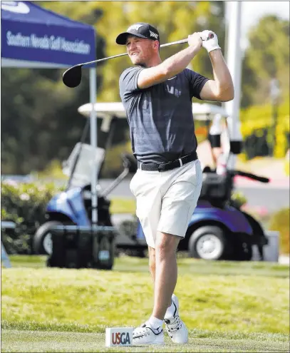  ?? Bizuayehu Tesfaye ?? Las Vegas Review-journal @bizutesfay­e Wyndham Clark follows his drive Monday during U.S. Open qualifying at Canyon Gate Country Club. Clark shot par 70 and was one four hopefuls to advance from the local qualifier to sectional competitio­n in mid-june.