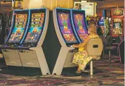 ?? BRIDGET BENNETT NEW YORK TIMES ?? A customer gambles Monday at Flamingo Las Vegas, Nev., hotel and casino.