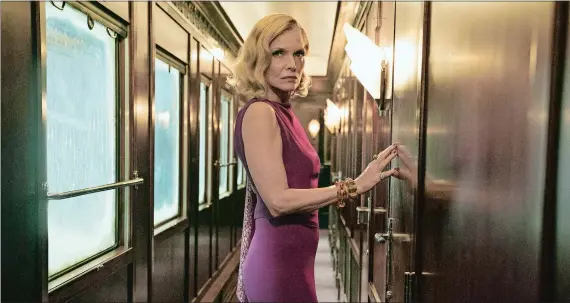  ?? NICOLA DOVE/TWENTIETH CENTURY FOX VIA AP ?? Michelle Pfeiffer in a scene from “Murder on the Orient Express.”